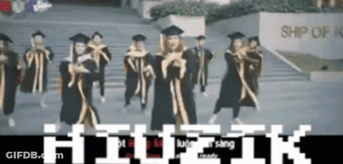 Graduates Dancing In Front Of Ship Sign GIF