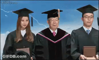 Graduates Standing Together GIF