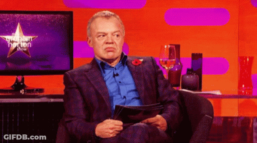 Graham Norton Suspicious Glare GIF