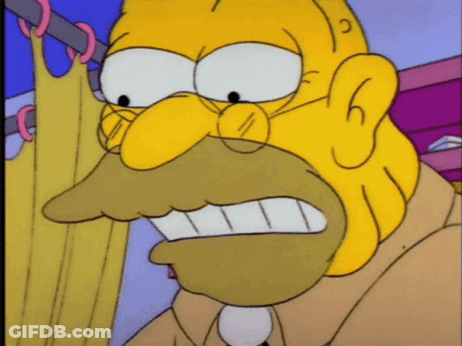 Grandpa Simpson's Dentures Falling Inside Crocodile Mouth GIF