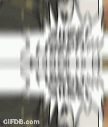 Gray And White Background With Reflection Of Person's Face GIF