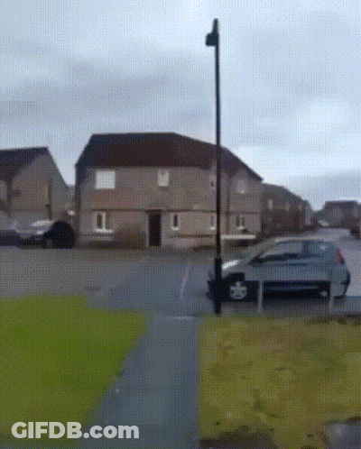 Gray Car Parked In Front Of House GIF