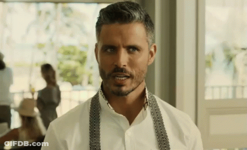 Gray-Haired Bearded Man In White Shirt And Suspenders GIF