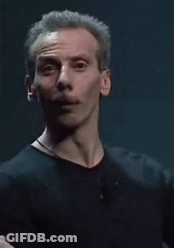 Gray-Haired Man Making Funny Face Raising Hand GIF