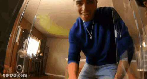 Gray Haired Man With Beard In Blue Shirt GIF