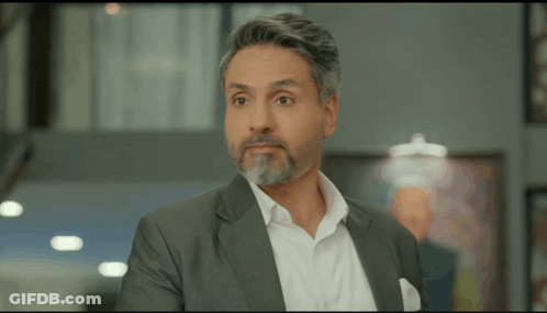 Gray Haired Man With Beard In Suit GIF