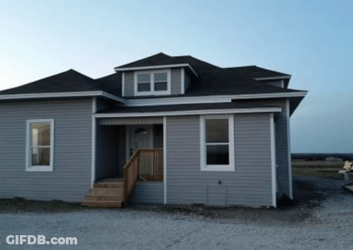 Gray House With Black Roof And Stairs GIF