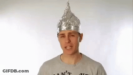 Gray Shirt Man Tin Foil Hat Making Face GIF