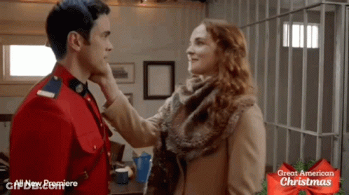 Great American Christmas Poster Man And Woman GIF