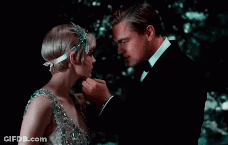 Great Gatsby Jay Holding Daisys Face GIF