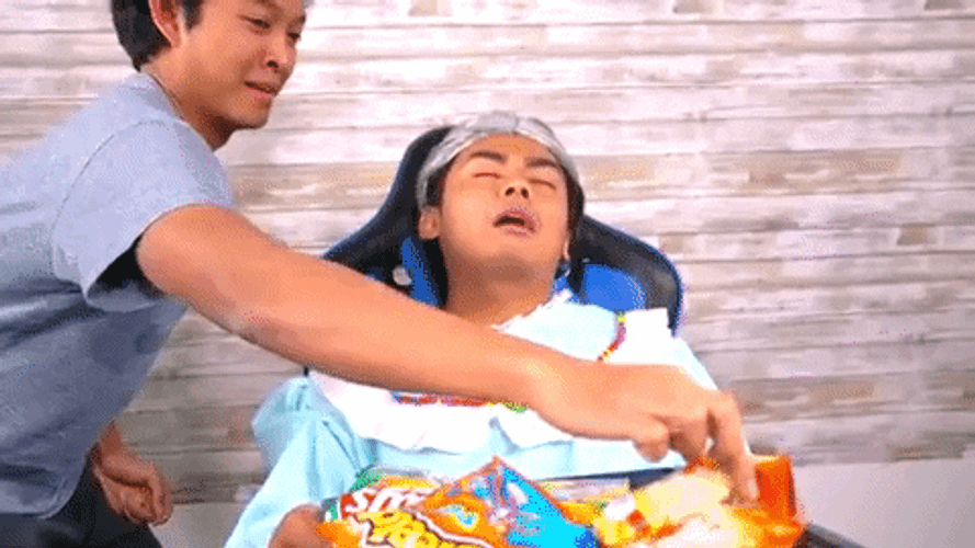 Greedy Boy Stole Food From Sleeping Boy GIF
