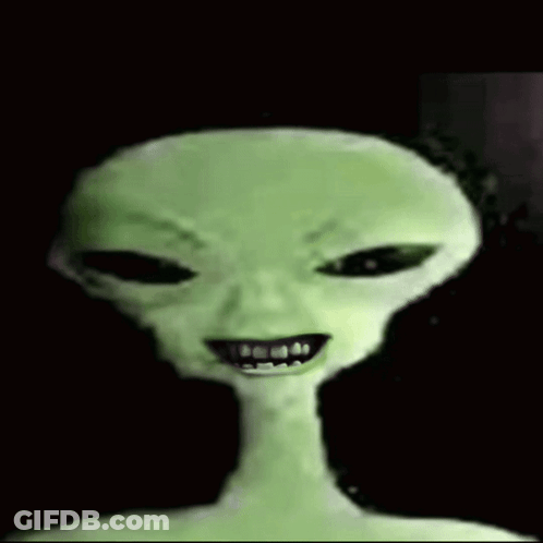 Green Alien Face With Black Eyes And Smile GIF