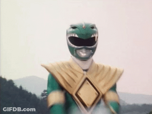 Green And Gold Power Ranger Standing In Field GIF