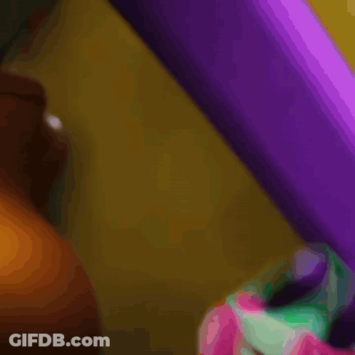 Green And Pink Object Close Up GIF