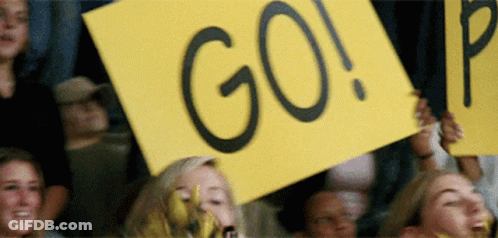 Green And Yellow Mascot Behind Fence With MLB.com GIF