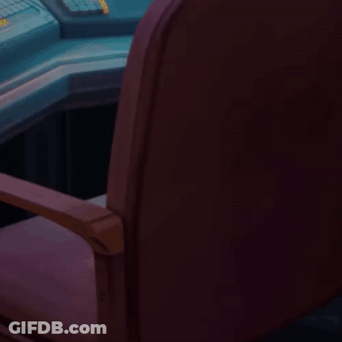 Green Apple On Chair Next To Coffee Mug GIF
