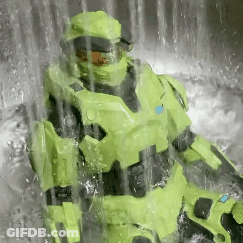 Green Armored Figure Sitting In Sink GIF