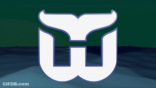 Green Background With White Whale Tail GIF