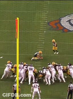 Green Bay Packers Football Players Standing On Field GIF