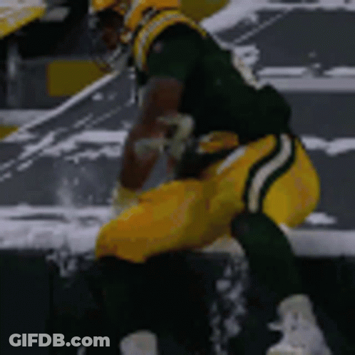 Green Bay Packers Player Kneeling On Field GIF