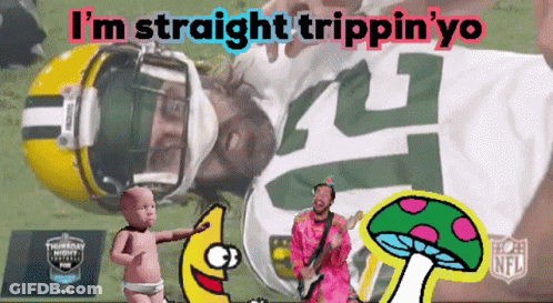 Green Bay Packers Player Laying On Field With Baby And Mushroom GIF