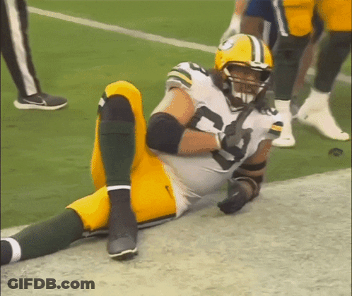 Green Bay Packers Player Laying On Ground GIF