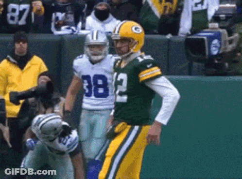 Green Bay Packers Player Next To Cowboys Player Number 38 GIF