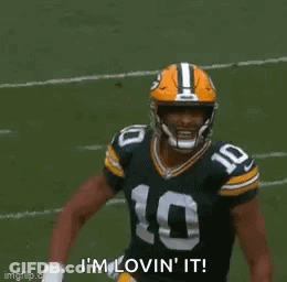 Green Bay Packers Player Running Saying I'm Loving It GIF