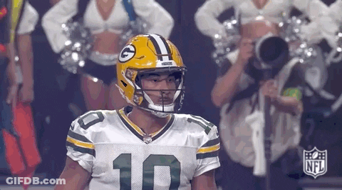 Green Bay Packers Player Sitting With Cheerleaders GIF