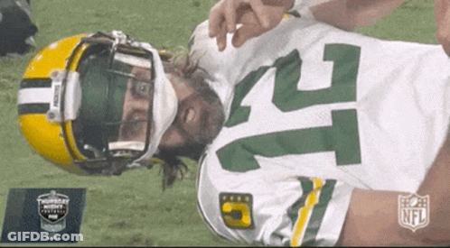 Green Bay Packers Player With Mask And Number 21 GIF