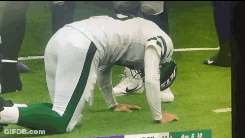 Green Bay Packers Player With Mask And Number 21 GIF