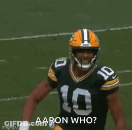 Green Bay Packers Players Holding Signs Saying GB 48 DAL 32 GIF
