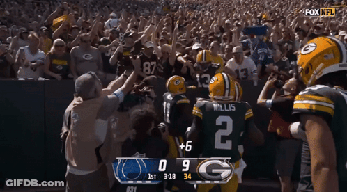 Green Bay Packers Players On Football Field GIF