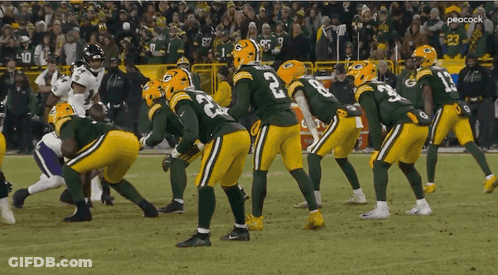 Green Bay Packers Players On Football Field GIF