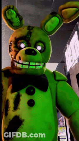 Green Bunny With Glowing Eyes Standing Before Dead Sign GIF