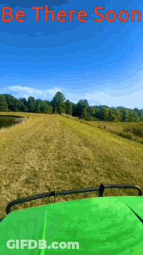 Green Car Driving On Grassy Road Be There Soon GIF