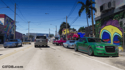 Green Car Parked On Street GIF