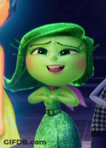 Green Cartoon Character With Purple Scarf Smiling GIF