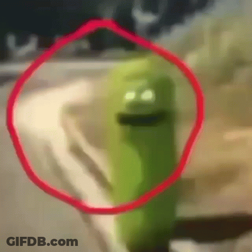 Green Cartoon Character With Red Circle Around Face GIF