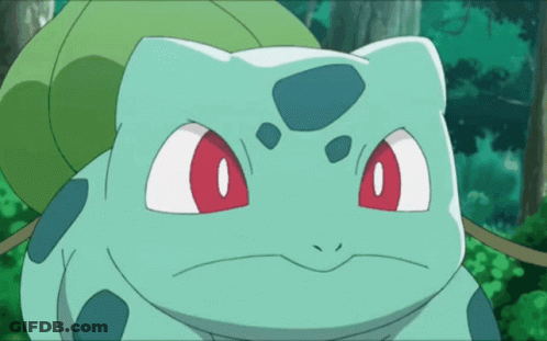Green Cartoon Character With Red Eyes And Leaf On Back GIF