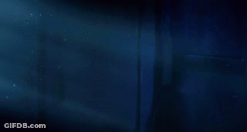 Green Cartoon Character With Yellow Eye Next To Mailbox GIF
