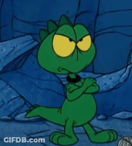 Green Cartoon Character With Yellow Eyes Arms Crossed GIF