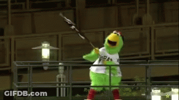 Green Chicken Mascot Holding Flag GIF