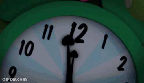 Green Clock Showing Almost Eleven GIF