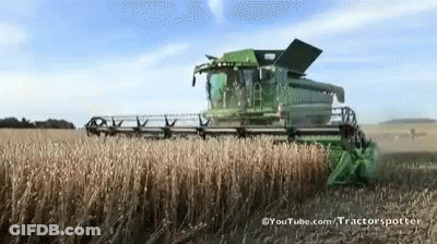 Green Combine Harvester In Field With YouTube.com GIF