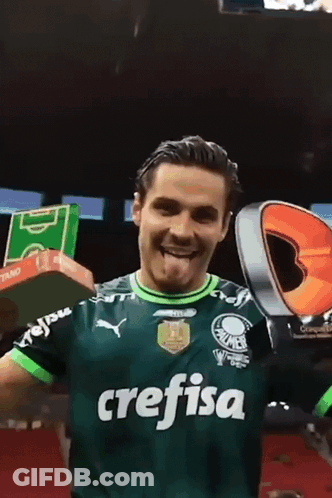 Green Crefisa Jersey Man Holds Up Trophy GIF