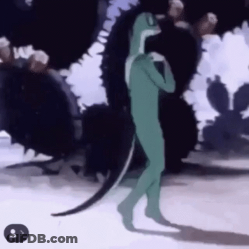 Green Dinosaur Holding Cell Phone By Cactus GIF