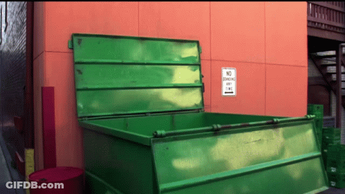 Green Dumpster With No Loading Sign GIF
