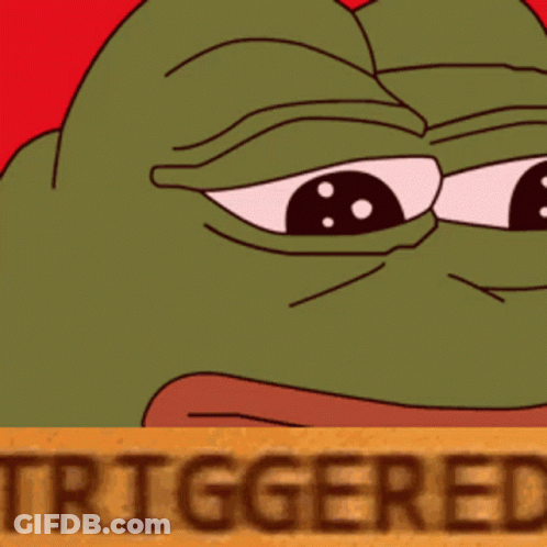 Green Frog Behind Brown Sign Saying Triggered GIF