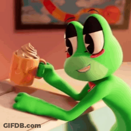 Green Frog Sitting At Table Holding Coffee And Ice Cream GIF